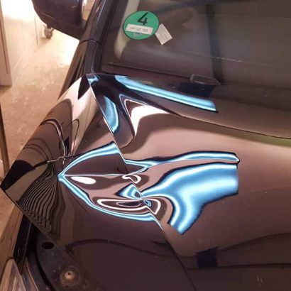 Delle in Fahrzeughaube - Hagelschadenpoint Baunatal - Beulendoktor Kassel